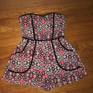 Strapless floral romper.